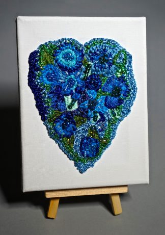 Blue heart on canvas