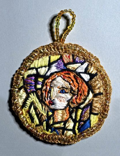 Redhead girl medallion with gold border