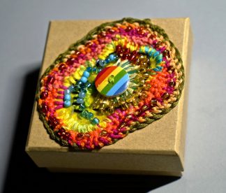 Small square wooden box with rainbow centre